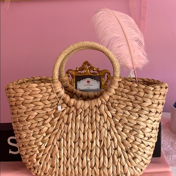 New York & Company Handbags - New York Co Straw bag.   Roomy inside. Price drop!